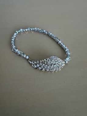 Vintage “Cookie Lee” Silver /gold tone Crystal like Wing Stretch Bracelet